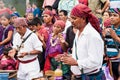 Unidentified Mayan people and tourists surround a fire in Tikal Royalty Free Stock Photo