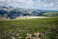 Unidentified motorcyle riders drive up the twisty roads of the Beartooth Highway