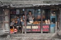 Unidentified nepalese men selling foods in a shop in the street of Kathmandu, Nepal