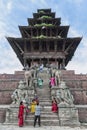 Unidentified Nepalese newari people in front of the Nyatapola Temple on Taumadhi square - Durbar Square of Bhaktapur, Nepal Royalty Free Stock Photo