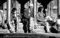 unidentified nepalese people enjoy sitting at the main tempel in Bakhtapur