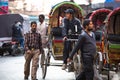 Unidentified nepali rickshaw in historic center of city, Nov 28, 2013 in Kathmandu, Nepal.