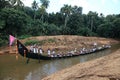 Oarsmen wearing traditional kerala dress participate in the Aranmula boat race