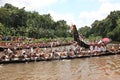 Oarsmen wearing traditional kerala dress participate in the Aranmula boat race