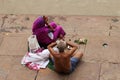 Old couple salute the Holy river Ganges