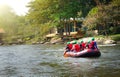 Unidentified people in action at rafting adventure