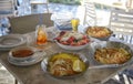 Unidentified people eating traditional delicious mediterranean dish outdoor restaurant in Cyprus