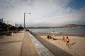 Unidentified people enjoying the beach in Bahia de