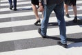 Unidentified people legs crossing street Royalty Free Stock Photo