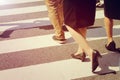 Unidentified people legs crossing street Royalty Free Stock Photo
