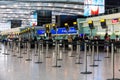 Unidentified people at one of the main Terminal Lounge of Heathrow Airport. Check-in area. London, United Kingdom Royalty Free Stock Photo