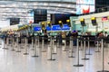 Unidentified people at one of the main Terminal Lounge of Heathrow Airport. Check-in area. London, United Kingdom Royalty Free Stock Photo