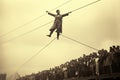 Unidentified people perform a balancing act as part of the Romanian National Day celebration, AI Generated
