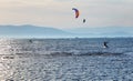 Unidentified people practising kite surf in Ebro Delta, Spain