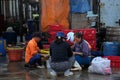 Unidentified people are processing fish at Qui Nhon Fish Port in the morning.