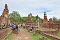 Unidentified people visit damaged Buddha statues Royalty Free Stock Photo