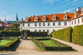 Unidentified people visit Wallenstein Palace currently the home of the Czech Senate in P