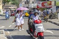 Unidentified people walk by the street with colonial architecture building at the background in downtown Kandy, Sri Lanka Royalty Free Stock Photo