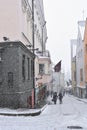 Unidentified people are walking in old town in Tallinn