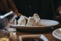 Unidentified person eating char siu bao with chopsticks Royalty Free Stock Photo