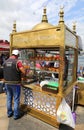 Unidentified Person selling Turkish Dessert Lokma at Eminonu