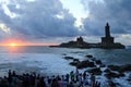 Unidentified pilgrims watch sunrise at Triveni Sangam, Kanyakumari, India.