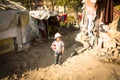 Unidentified poor children near their houses at slums in Tripureshwor district, Kathmandu.