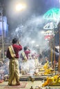 Ganga aarti rituals performed by young priests on the bank of Ganges rivert at Varanasi India. Royalty Free Stock Photo