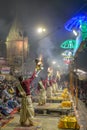 Ganga aarti rituals performed by young priests on the bank of Ganges rivert at Varanasi India. Royalty Free Stock Photo