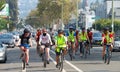 Unidentified protestor in cars and bicycle caravan promoting prop 15