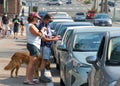 Unidentified protestor preparing for a cars and bicycle caravan promoting prop 15