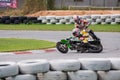 Unidentified racers slip Kawasaki KSR