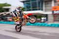 Unidentified racers stunt super motard bike