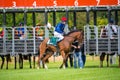 Unidentified riders, race on the racecourse