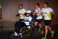 Unidentified runner with disability in the marathon night of Bilbao, celebrated in Bilbao