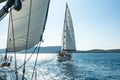 Unidentified sailboats participate in sailing regatta on Aegean Sea. Royalty Free Stock Photo