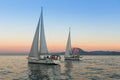 Unidentified sailboats participate in sailing regatta