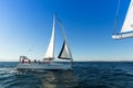 Unidentified sailboats participate in sailing regatta 12th Ellada Autumn 2014 on Aegean Sea. Royalty Free Stock Photo