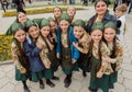 Unidentified school girls in national Georgian costumes playing together at the party