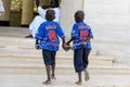 Unidentified Senegalese boys in sportwear walk in the Great Mos