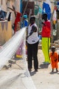 Unidentified Senegalese man holds a fishing net at the local ma Royalty Free Stock Photo