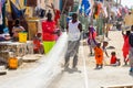 Unidentified Senegalese man holds a fishing net at the local ma Royalty Free Stock Photo