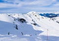 Unidentified skiers enjoy skiing at the slope in the Alps