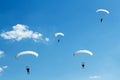 Unidentified skydiver on blue sky Royalty Free Stock Photo