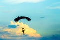 Unidentified skydiver, parachutist on blue sky Royalty Free Stock Photo