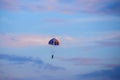 Unidentified skydiver, parachutist on blue sky Royalty Free Stock Photo