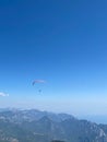 Unidentified skydiver, parachutist on blue sky Royalty Free Stock Photo