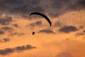 Unidentified skydiver, parachutist on dramatic sky Royalty Free Stock Photo