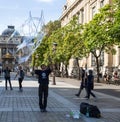 Unidentified street artist blows huge colorful soap bubbles in Paris on September 9, 2018