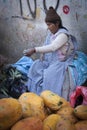 Unidentified street woman vendor wearing traditional clothing in the local Rodriguez market, selling fruits, in La Paz - Bolivia. Royalty Free Stock Photo